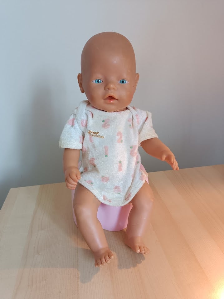Baby Born pop met kleertjes & accessoires – klaar voor uren speelplezier!