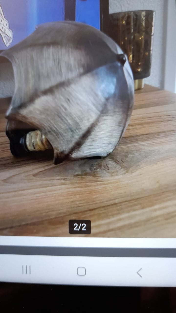 Jongen onder paraplu Hummel