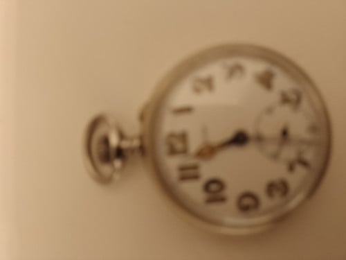 Oud zak horloge met stof kast