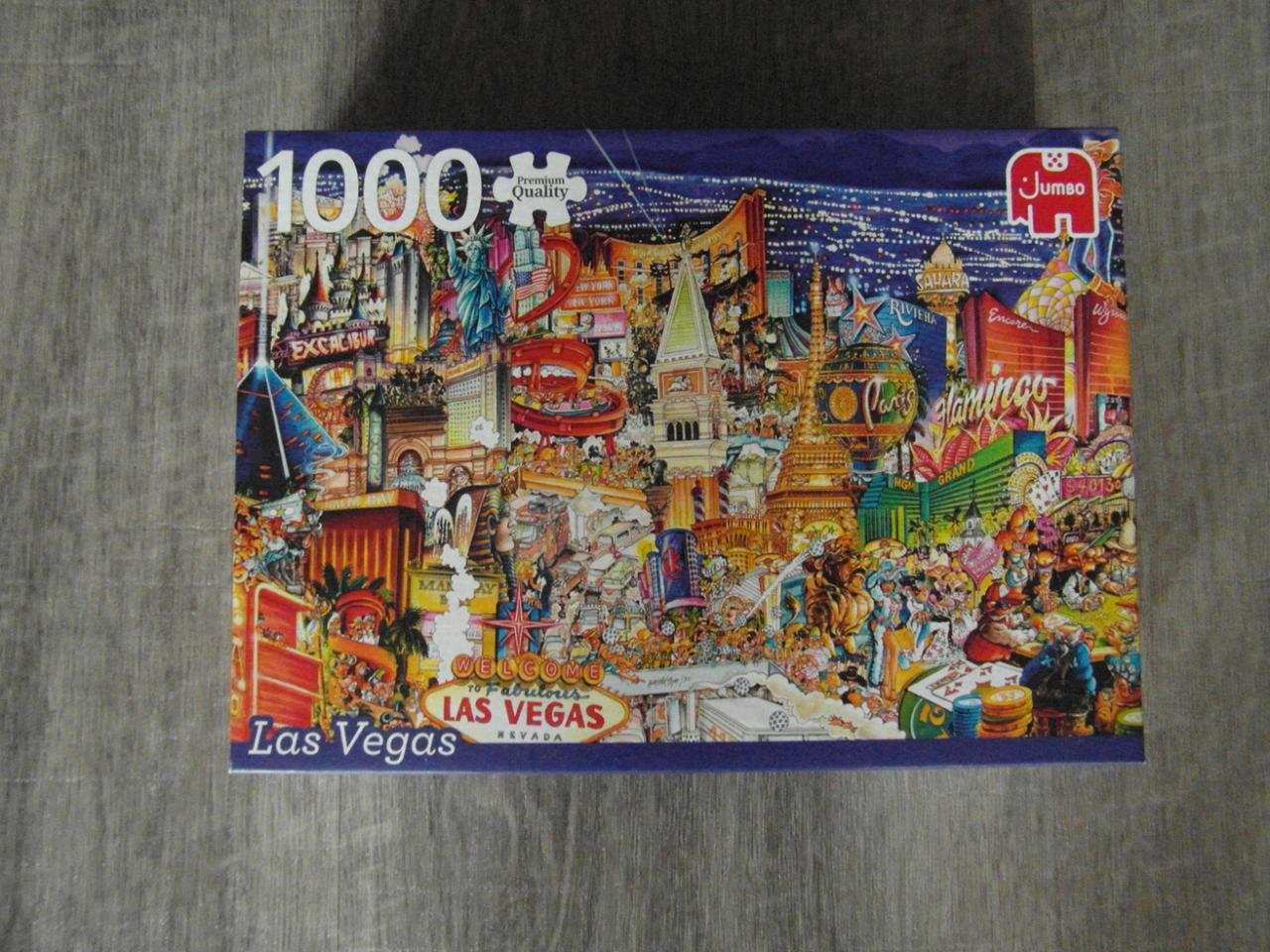 2 jumbo puzzels 1000 stukjes. ''Het Strand Huis'' en ''Las Vegas""