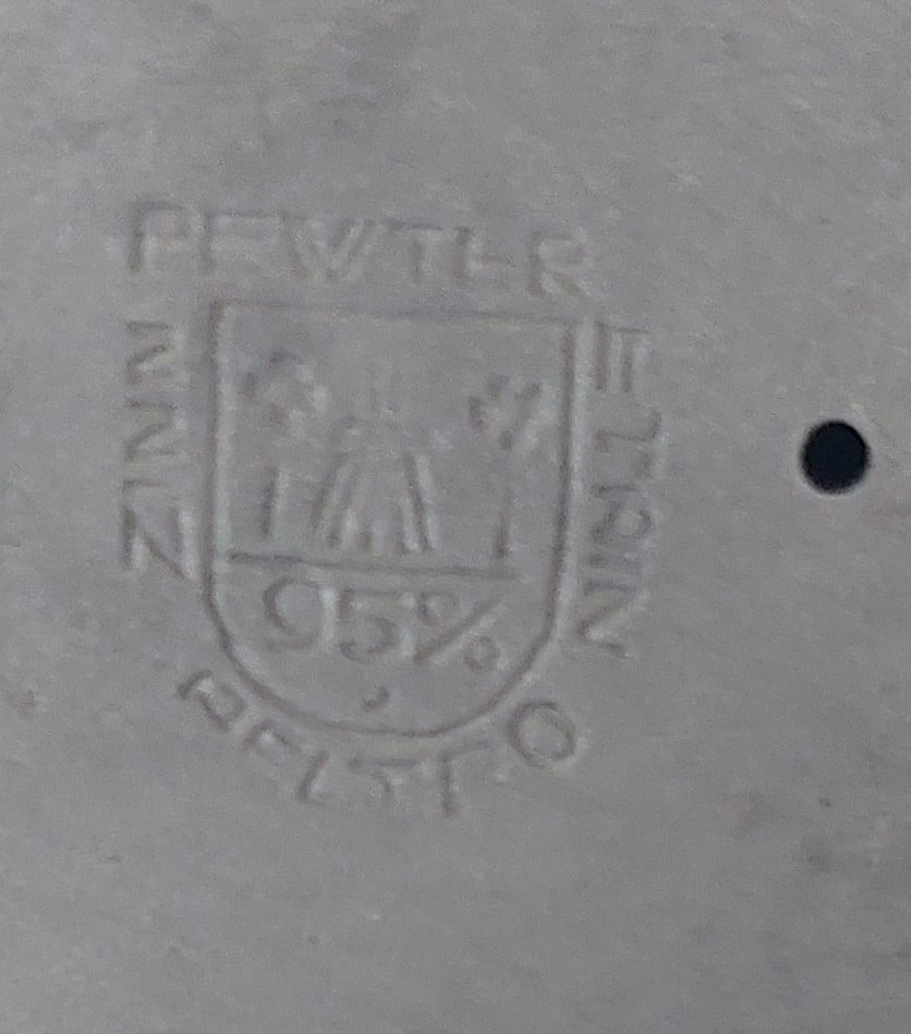 Tinnen Buste.