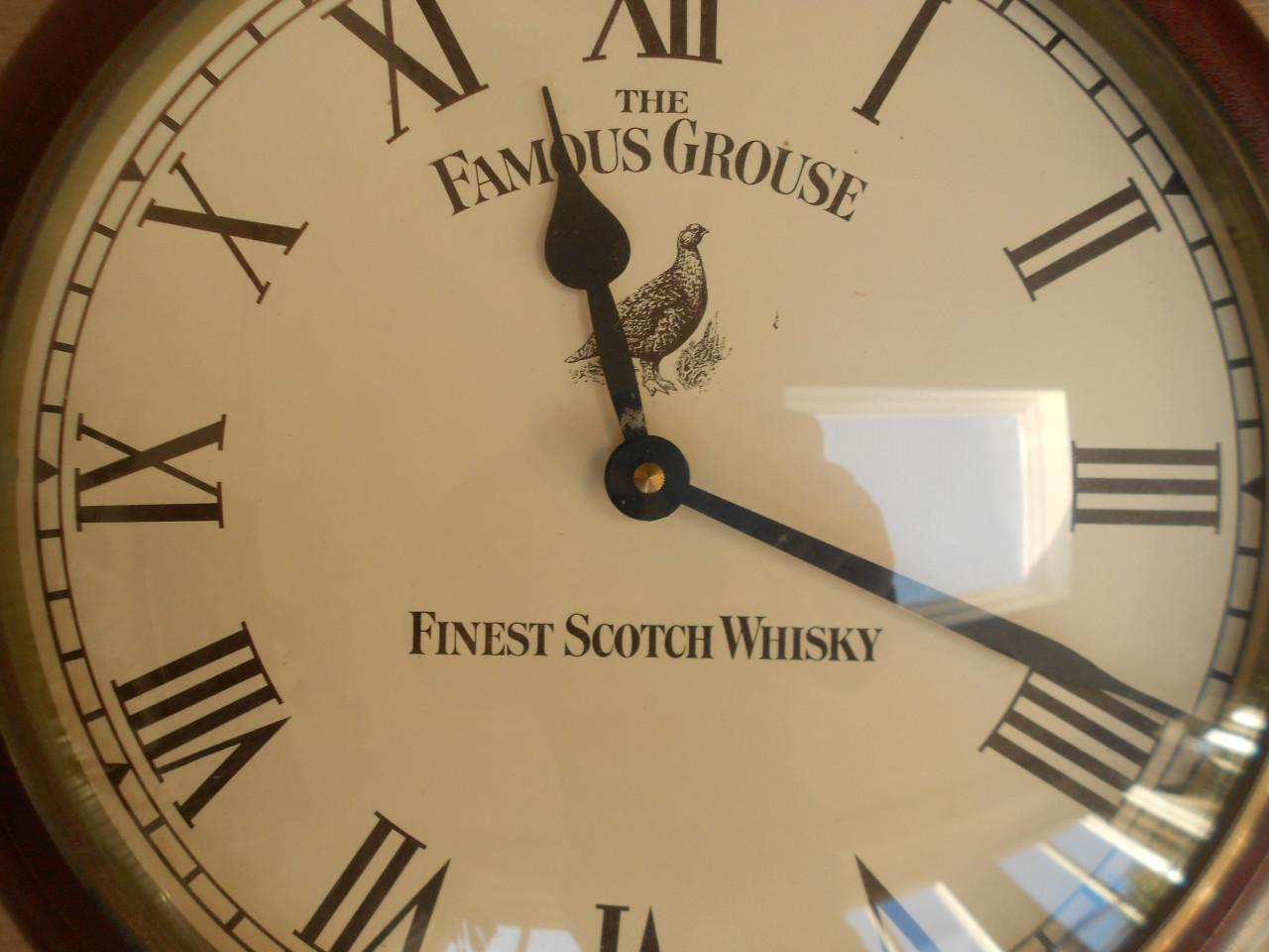 Vintage famous grouse whisky pub cafe kroeg  klok.