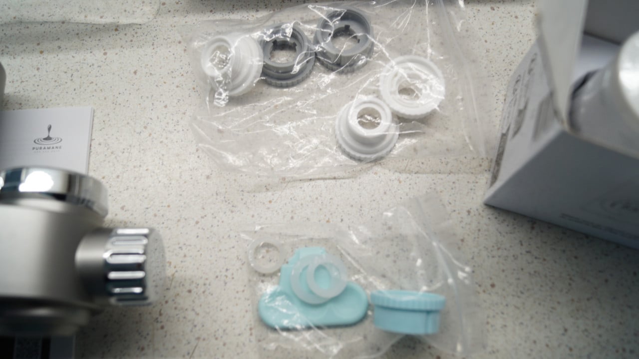 Puramane waterfilter voor op de kraan met 2 extra filters.