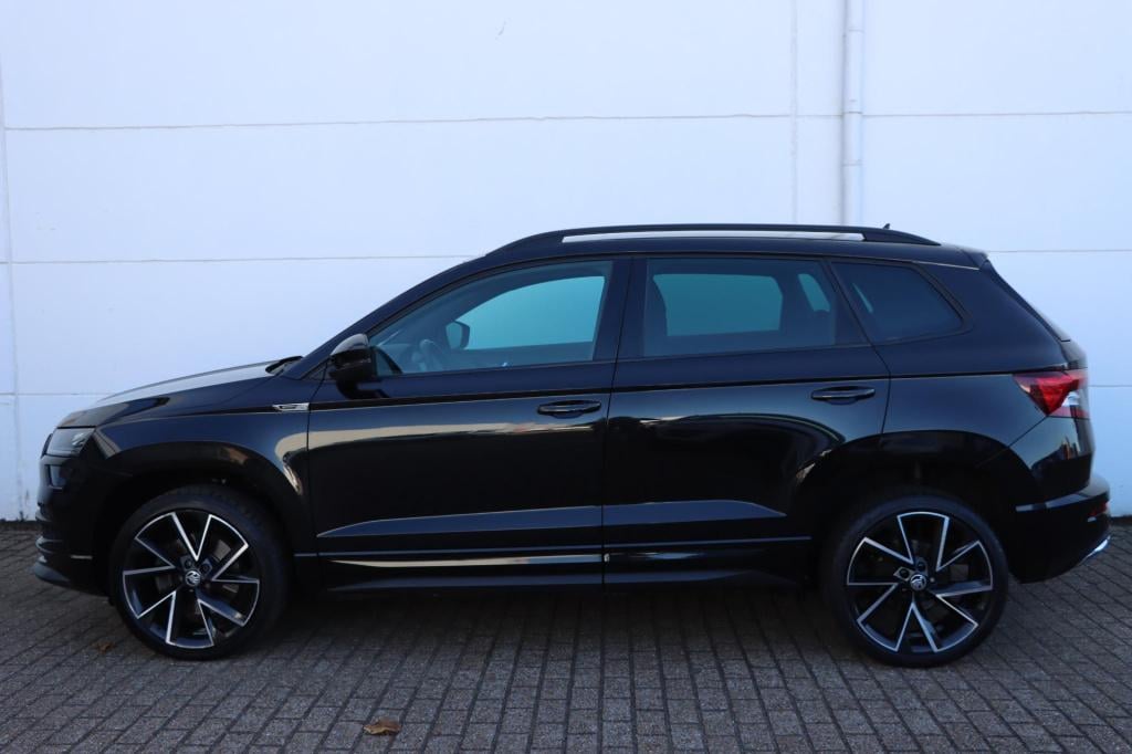 Skoda Karoq 1.5 tsi 150pk dsg7 sportline business trekhaak | camera | carpl