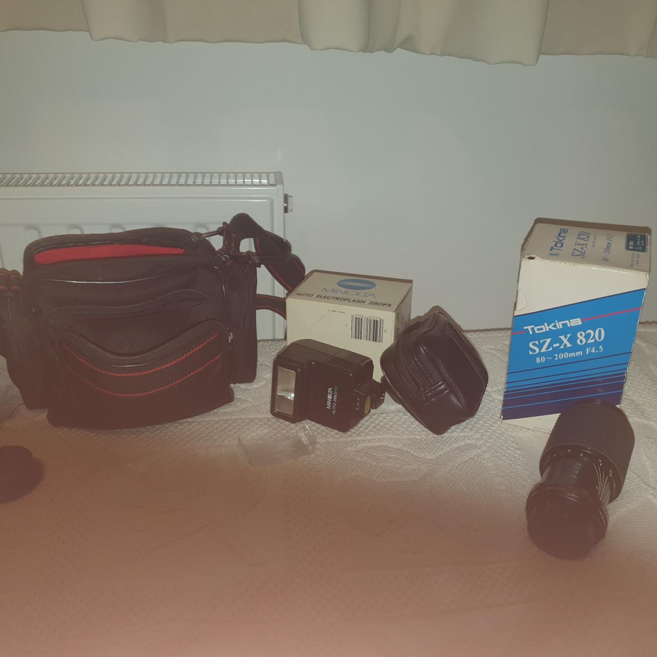 Minolta spiegelreflexcamera X-700 met objectief en tas