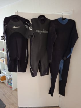 Gratis 3 surfpakken / wetsuits