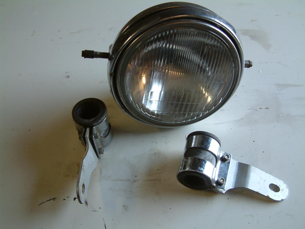 Motor koplamp met bevestiging  goede reflectoer