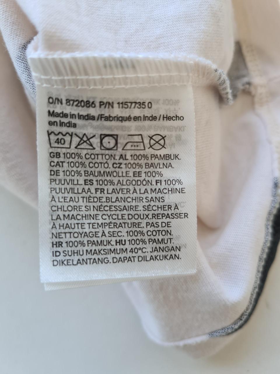 Ecru wit met zwarte bolletjes jurk van H&M  Maat 122-128