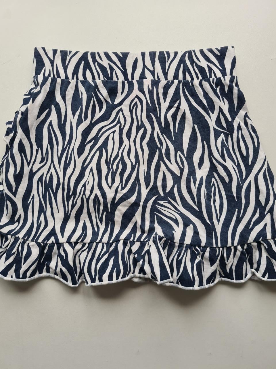 Leuke zebraprint rok met ruches - Maat 128-134