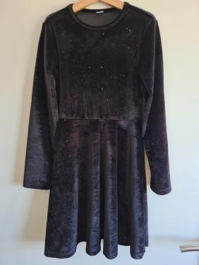 Zwart fluweel jurkje met glittertjes van Zeeman  Mt 134-140