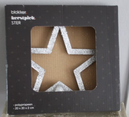 Nieuw in verpakking zilverkleurige glitter piek ster