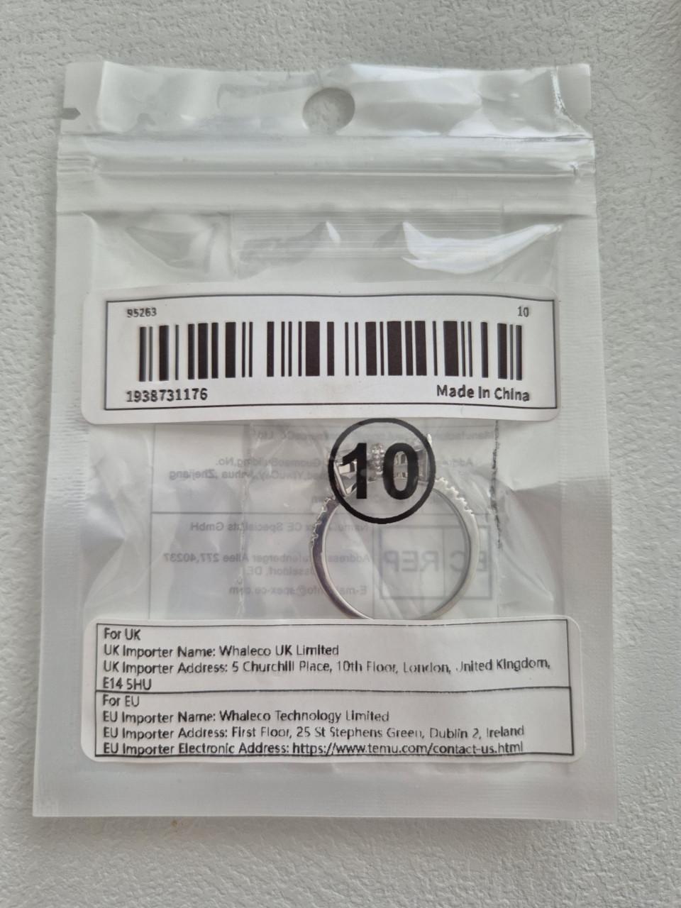 Zilverkleurige ring met strik