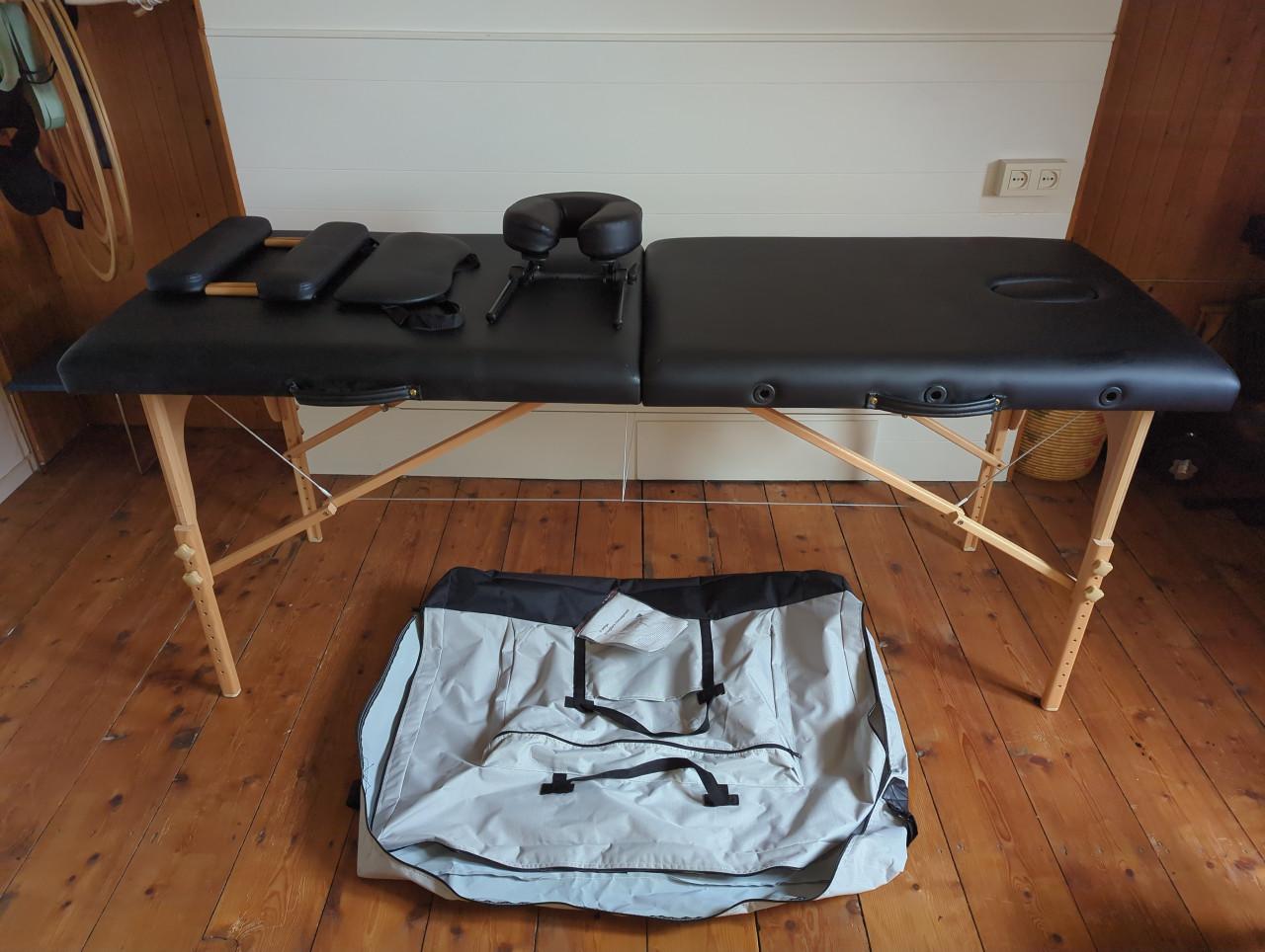 Opvouwbare massagetafel met draagtas en accessoires