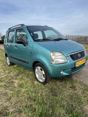 Suzuki wagon 145000 km met draai-kiep-schuifdak licht met velgen