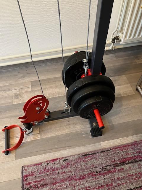 Cable cross fitness machine