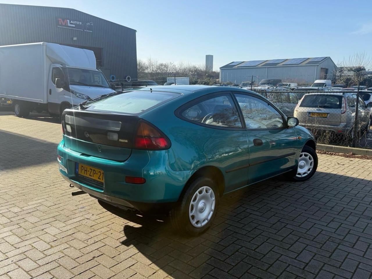 Mazda 323 - 1.5i LX 62.220KM Nap Automaat