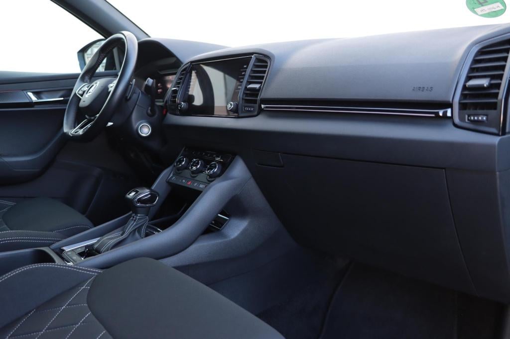 Skoda Karoq 1.5 tsi 150pk dsg7 sportline business | trekhaak | camera | car