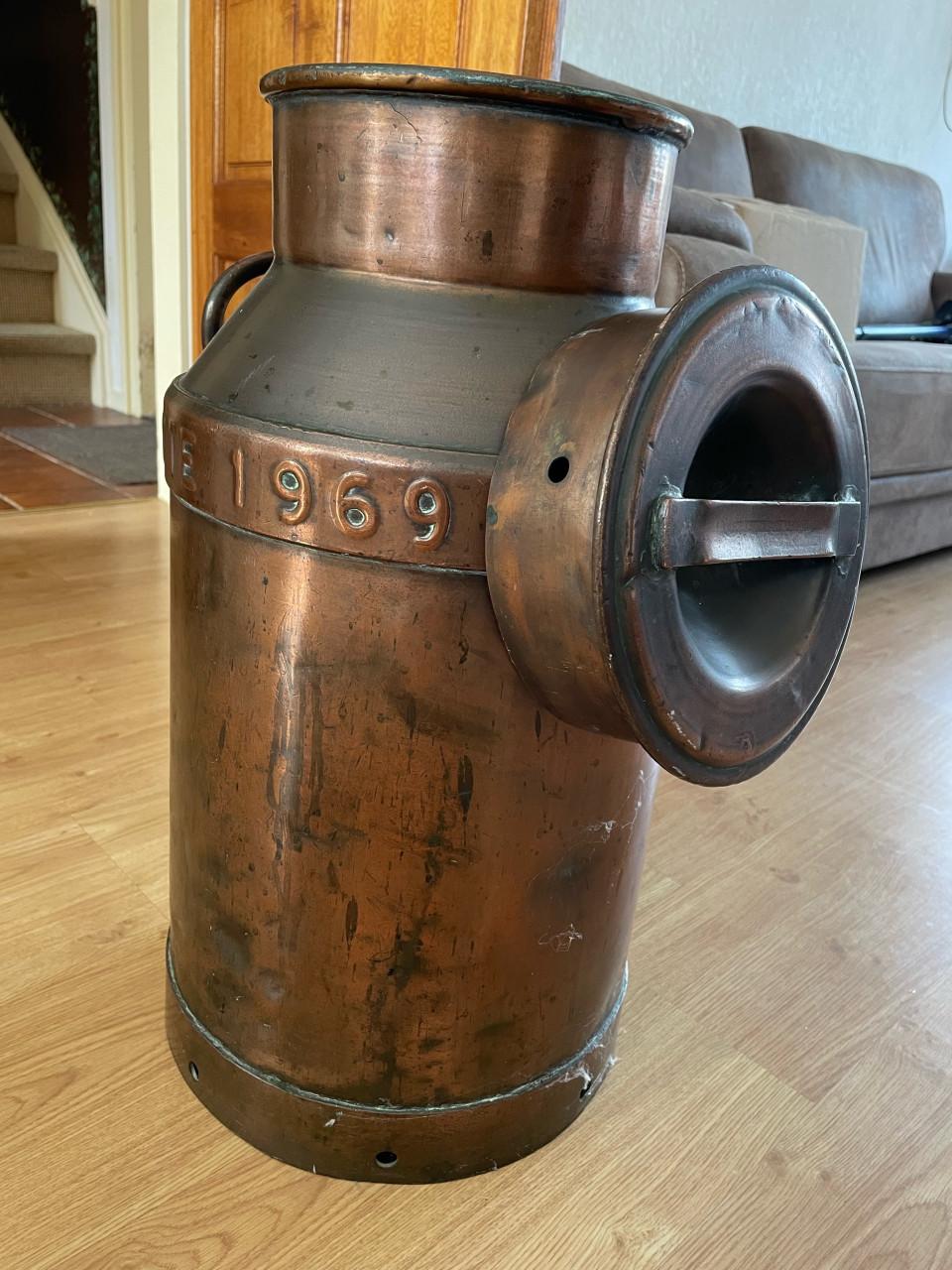 Antieke koperen melkbus