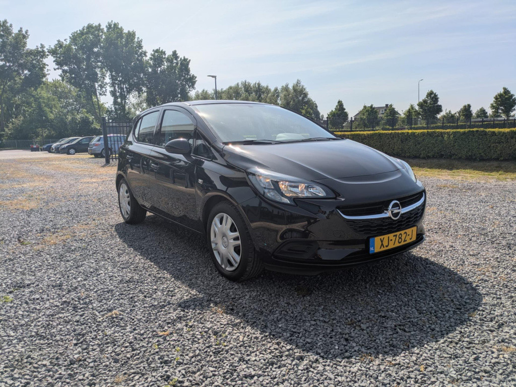 Opel Corsa 1.4 favourite | airco | cruise control | bluetooth
