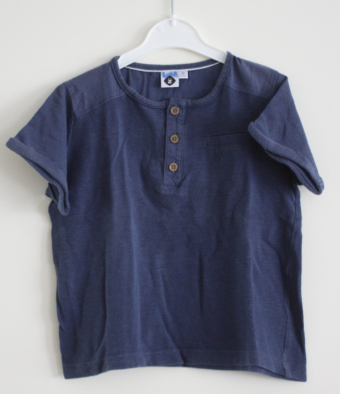 Dokerblauw shirt met knoopes maat 98