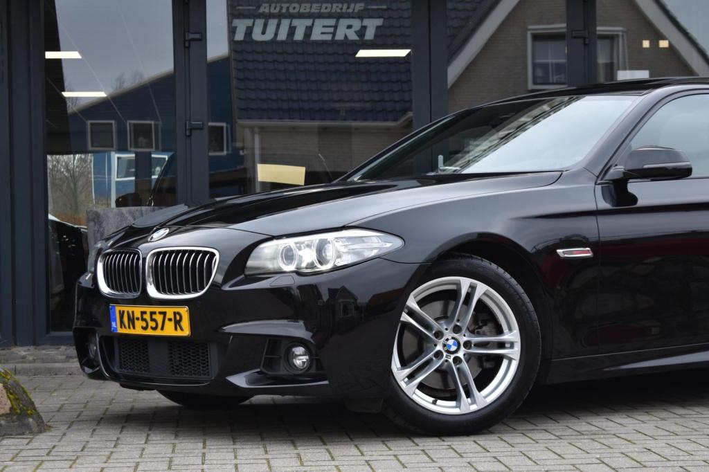 BMW 5 Serie 520i m sport | schuifdak | camera | leder | nap | adapt. cruise