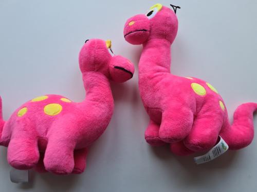 Nieuwe fuchsia roze Dino knuffel Twee stuks voor €2,95