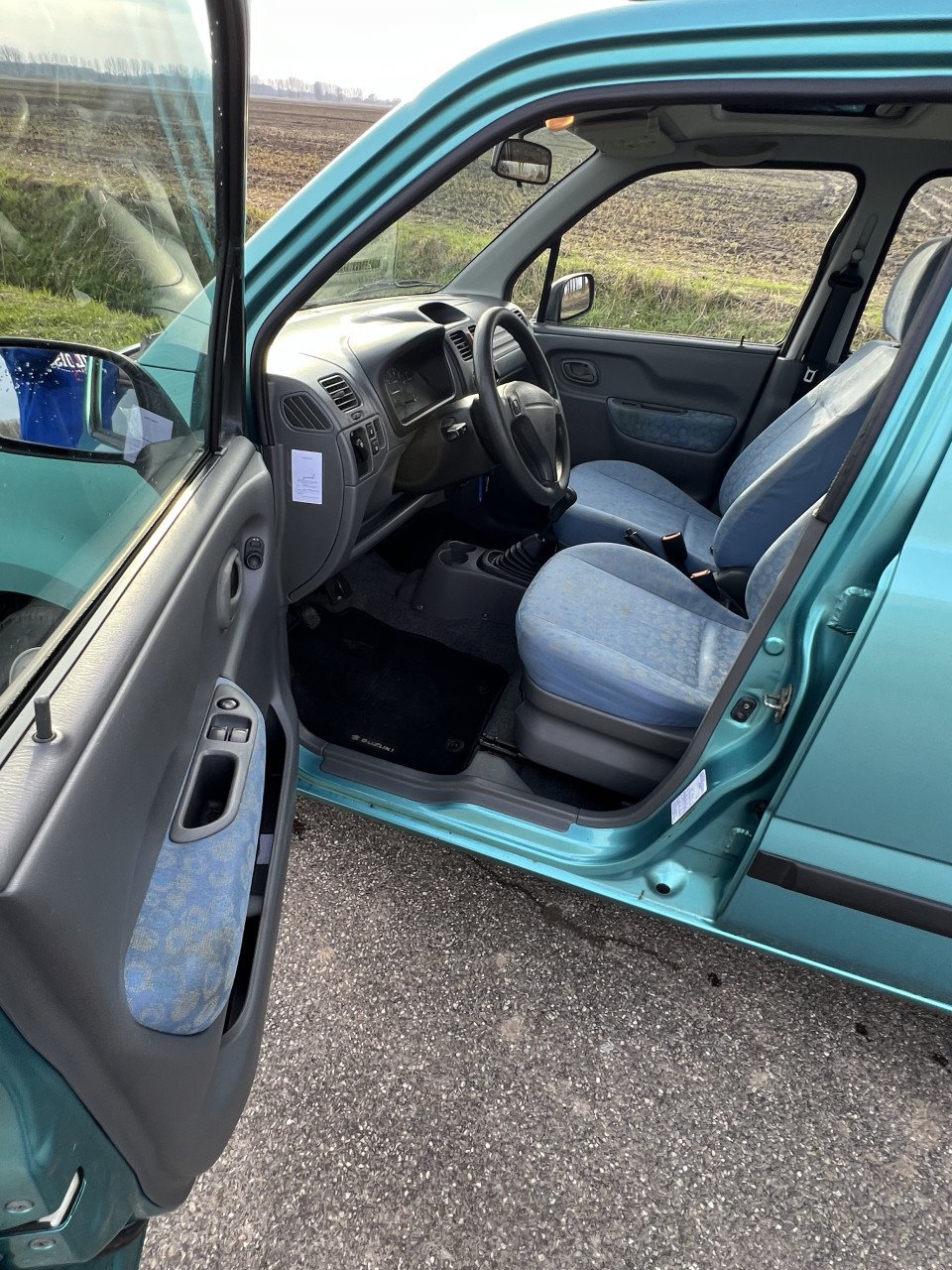 Suzuki wagon 145000 km met draai-kiep-schuifdak licht met velgen