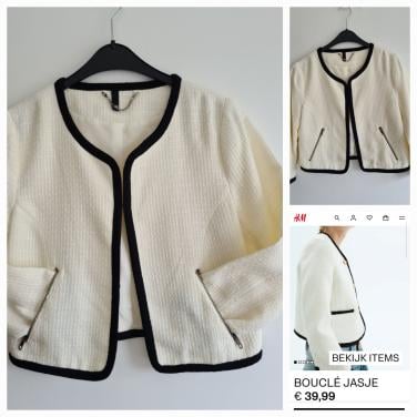 H&M bouclé jasje in de kleur room wit met zwarte bies. Maat 40