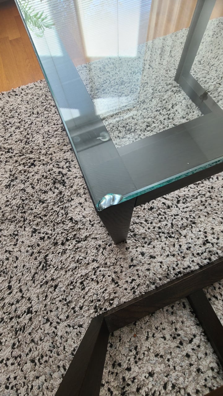 Salontafel glazen blad met houten onderstel