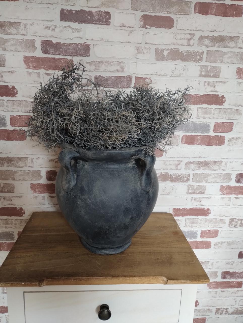 Mooie grijze pot met decoratie