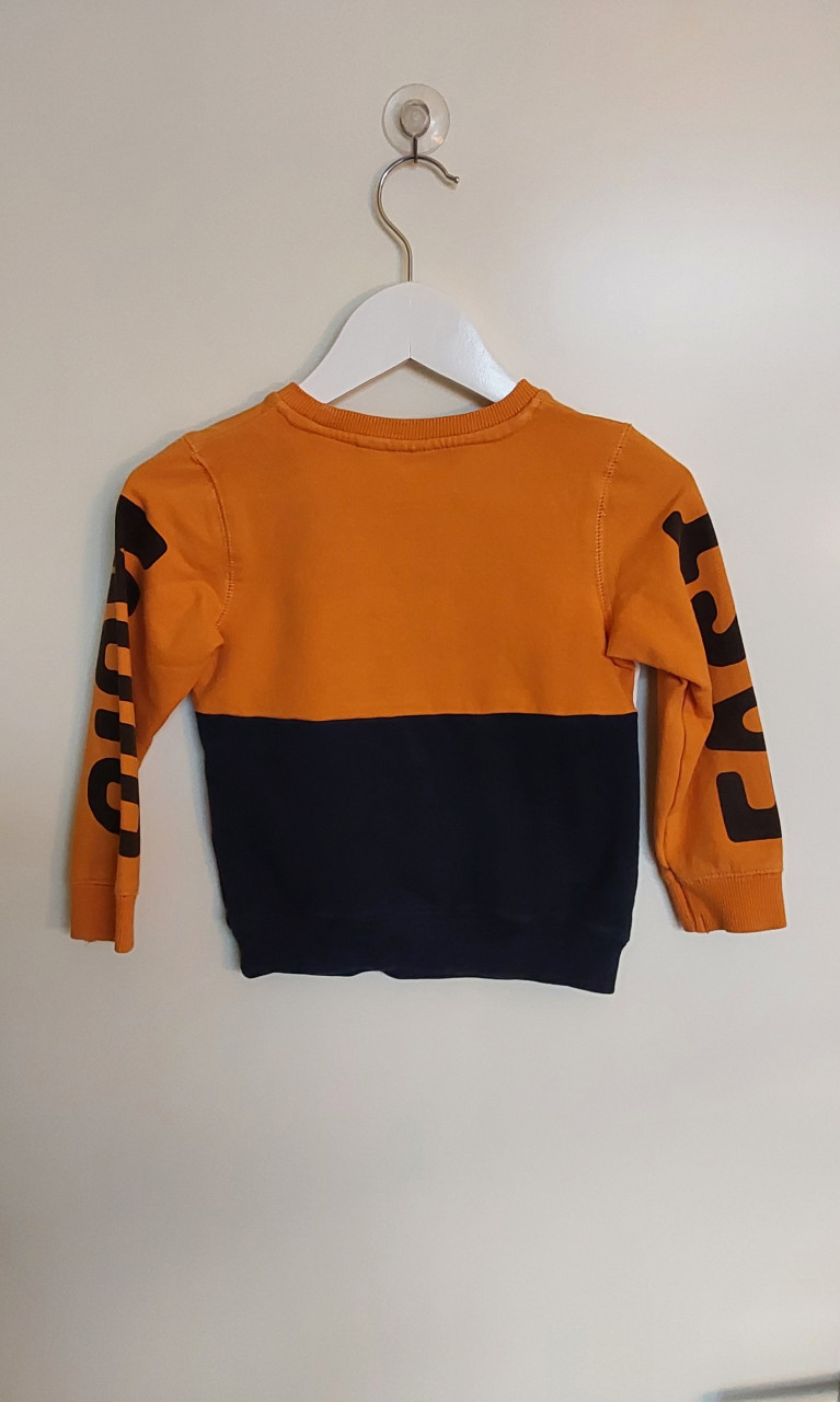 Oranje trui in maat 92 van het merk Name It