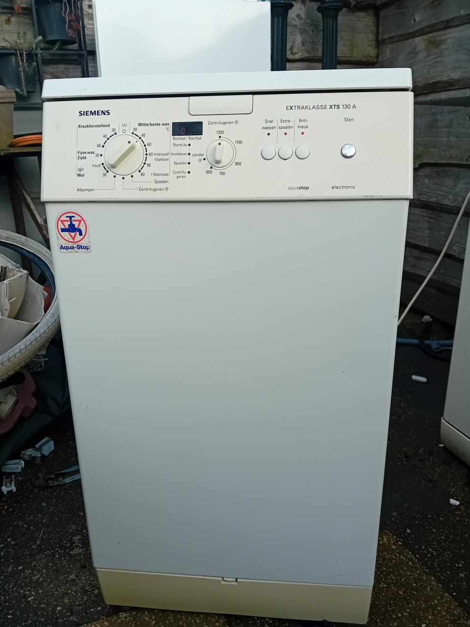 Wasmachine boven lader