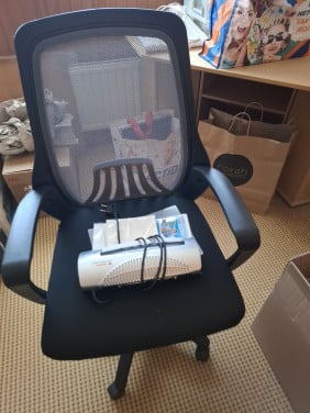 Bureau stoel met lamineren apparaat