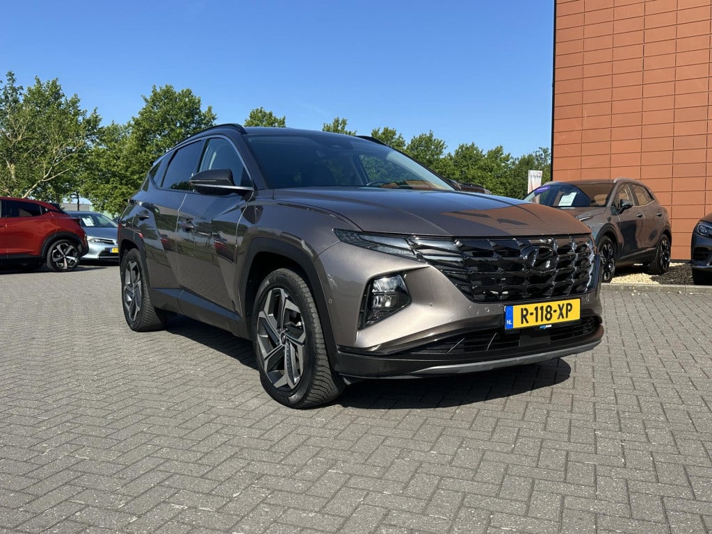 Hyundai Tucson 1.6 t-gdi phev premium 4wd | trekhaak | vol-leder | adapt. c