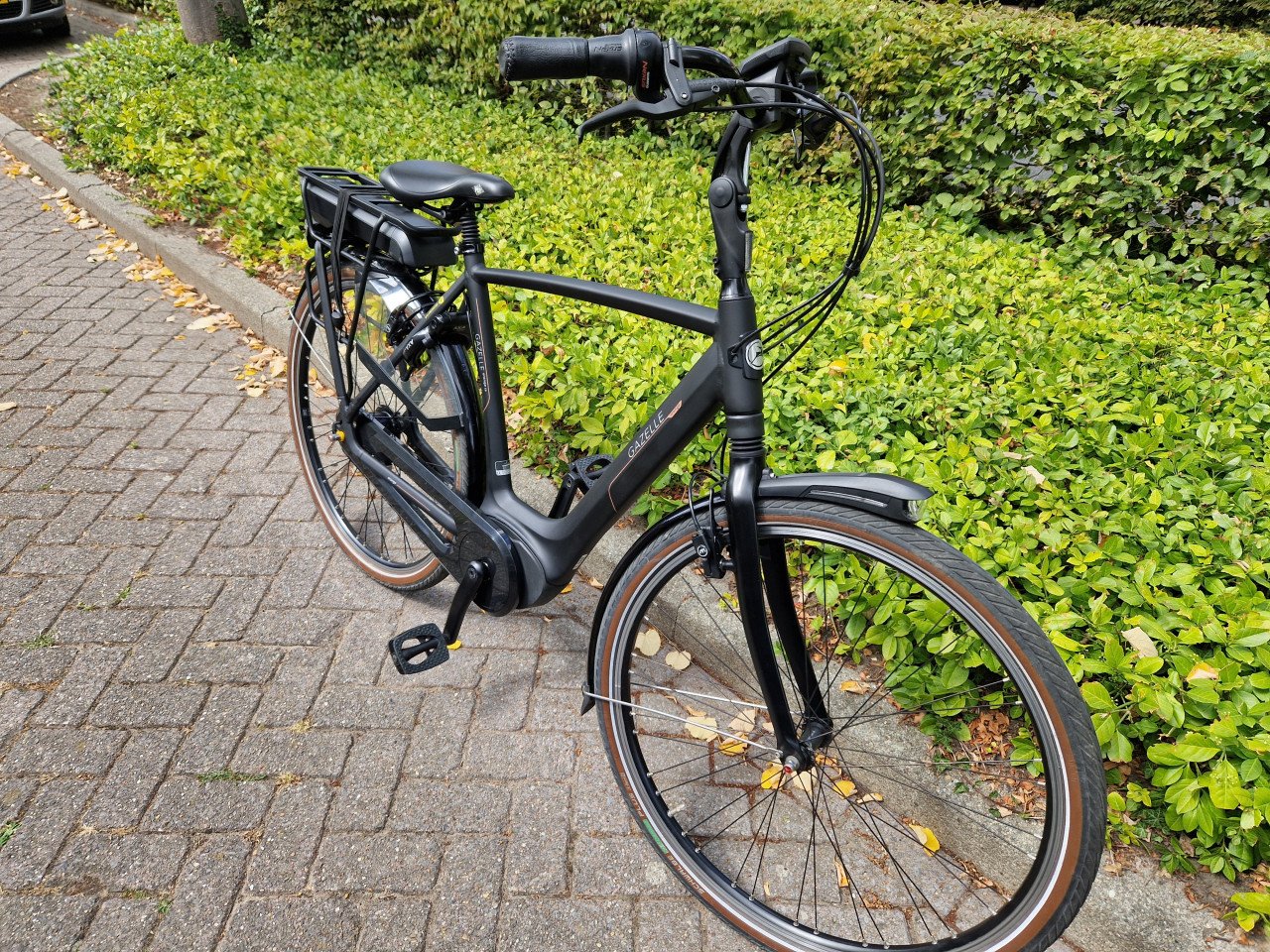 Zo goed als nieuwe Gazelle Orange elektrische heren fiets met Bosch motor