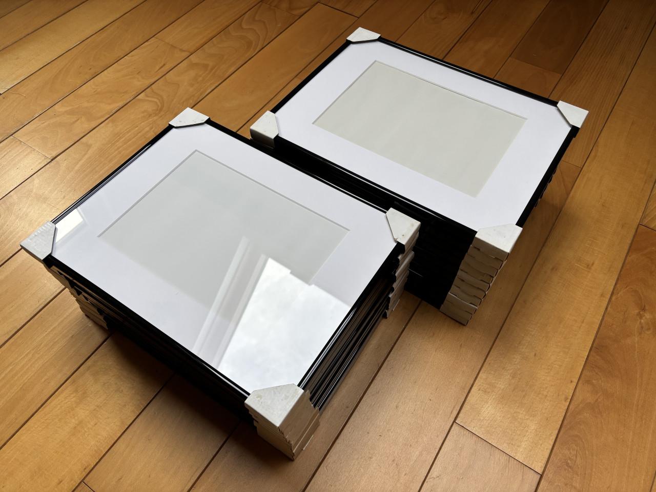 Fotolijsten ( zwart ) met passe-partout ( wit )