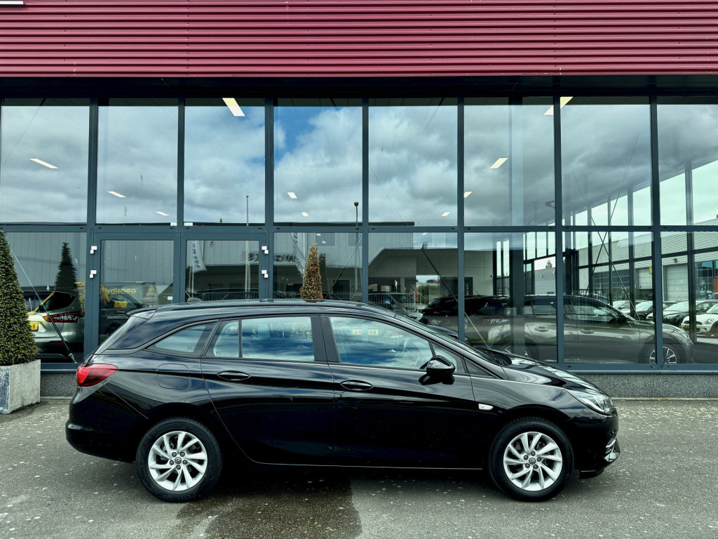 Opel Astra sports tourer 1.2 business edition+ navi ecc cruise