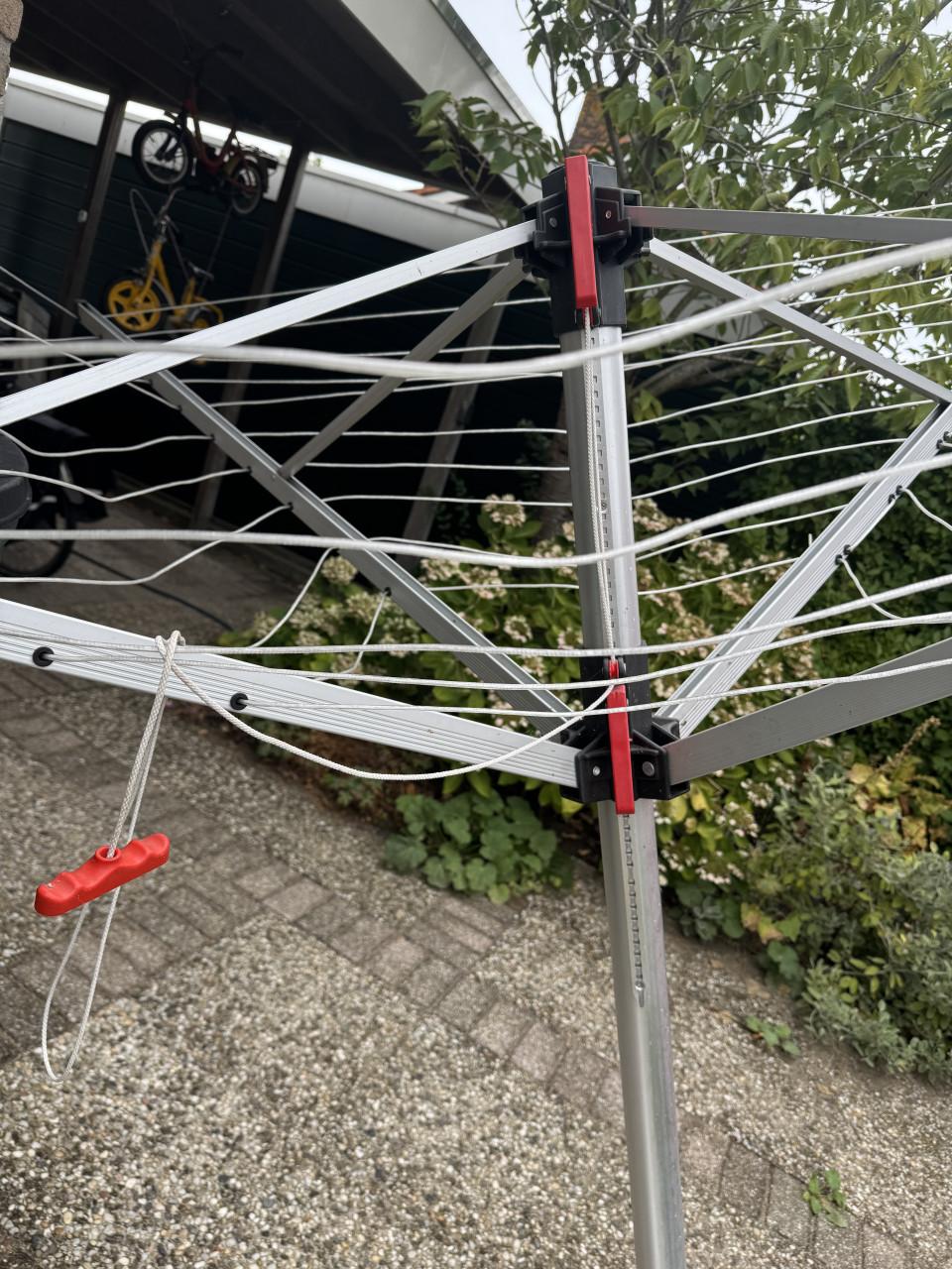 Complete droogmolen, met grondanker en hoes