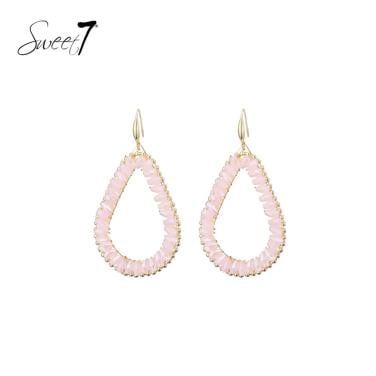 Oorbellen roze met fijne kralen en een goudkleurige rand