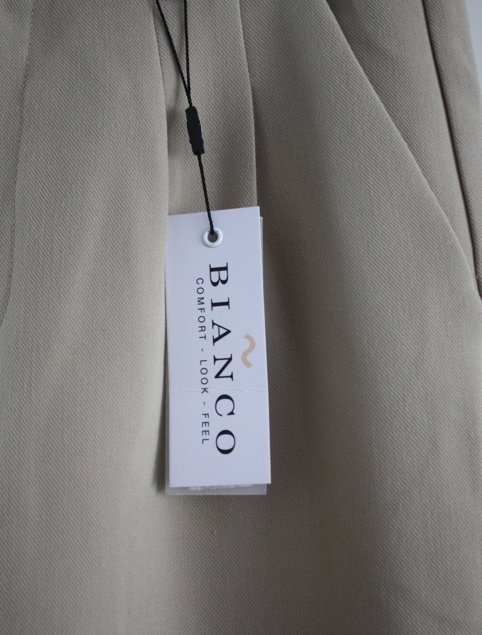 Nieuwe beige wijde pantalon maat 38