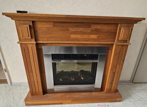 Elektrische openhaart met houten schouw