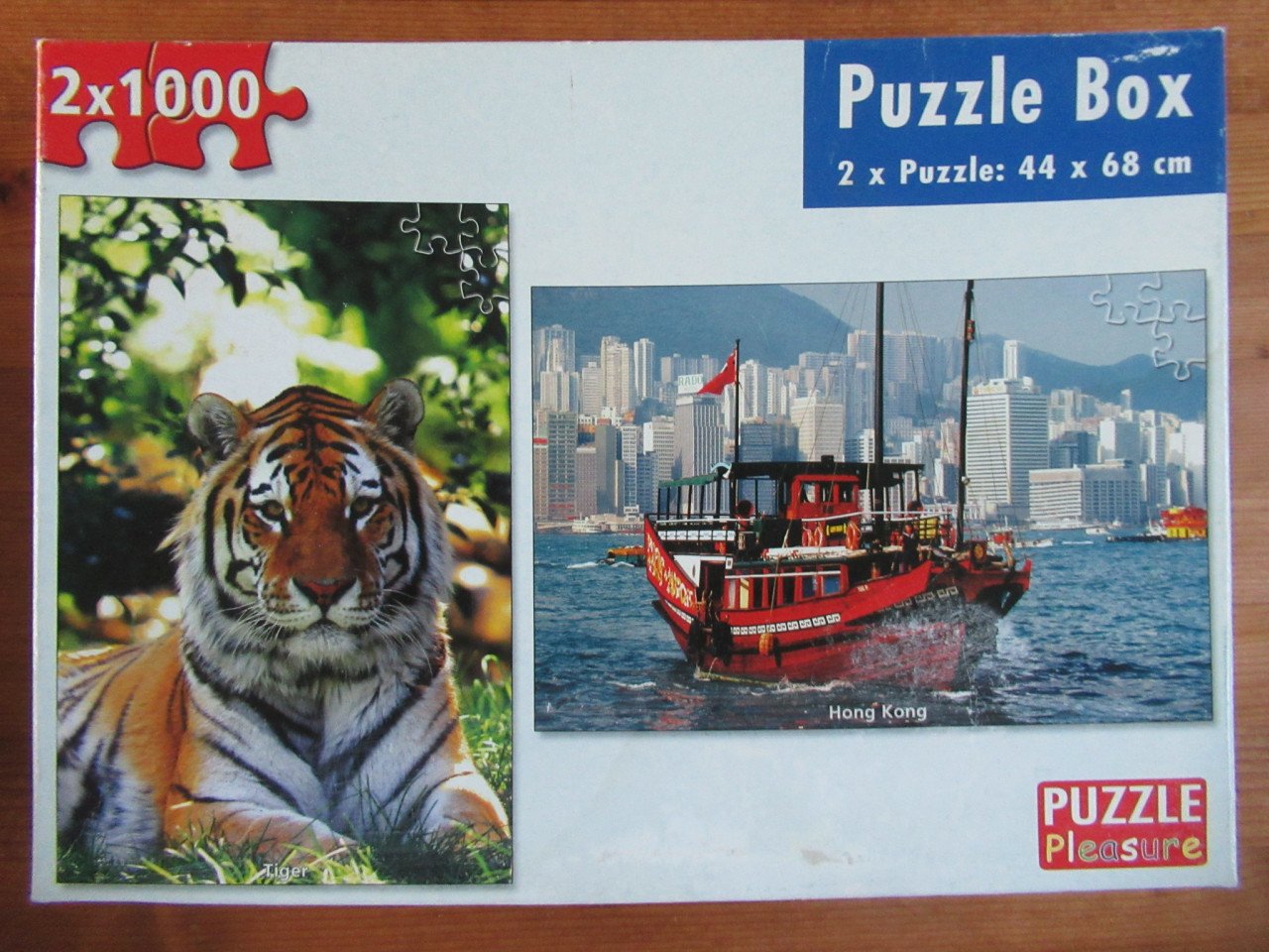 3 dozen met elk 2 leuke volledige puzzels van 1000 stukjes, zgan