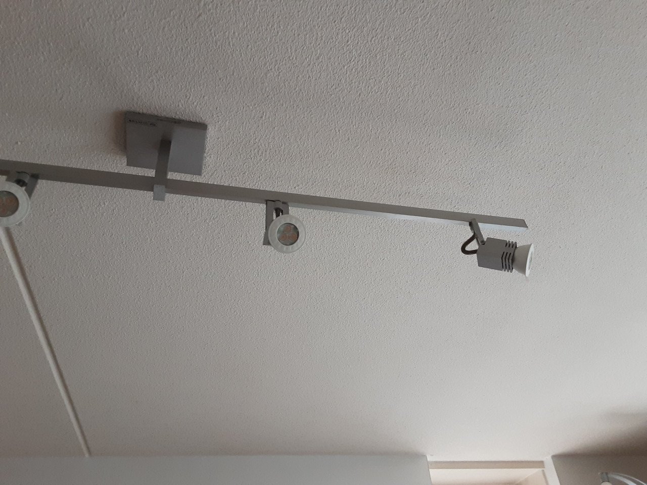 Vloerlamp, rails met 4 spots en rails met 4 (verschuifbare) spots