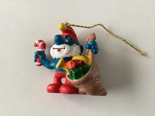 Kerstsmurf met koord en geschenkenzak.     Merk: Schleich/Peyo. Nr. 5.1903