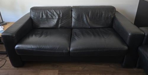 Zwart lederen 2 + 2.5 zits bank