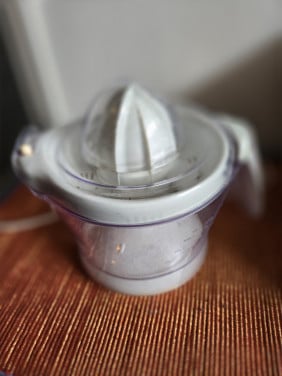Citruspers Philips Cucina 600ml met regelbare sap/vruchtvlees opening.
