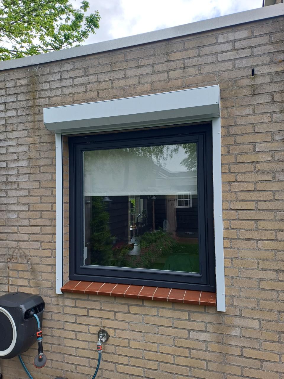 Rolluik handbediend