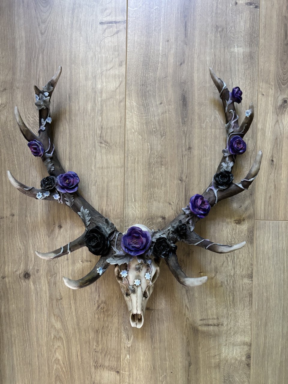 Wanddecoratie gewei met bloemen