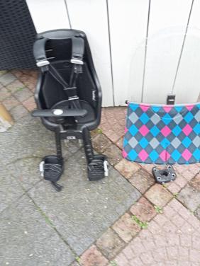 Te koop fietsstoeltje ( voorzitje ) inclusief windscherm.