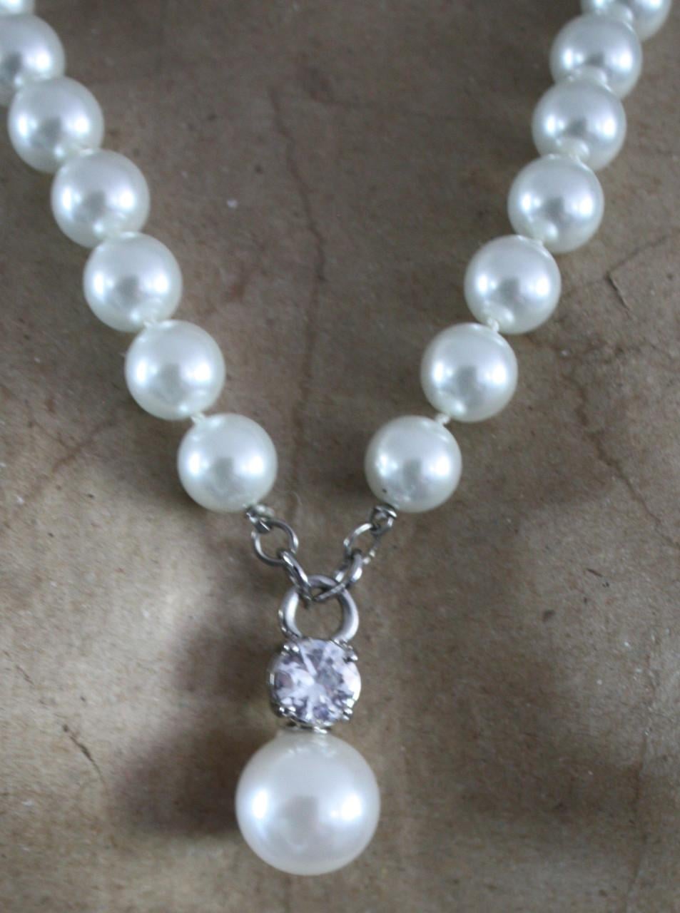 Witte parelketting met hanger